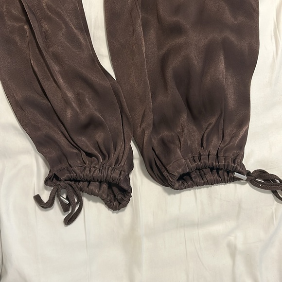 Chocolate brown satin cargo pants from Anthropologie with elastic ankles - Picture 4 of 6